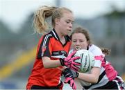26 June 2016; Ally Cahill, Killygarry, Co. Cavan in action against Katie Scully, Kilcullen, Co. Kildare during the John West Féile Peile na nÓg Division 2 Girls Final at Austin Stack Park in Tralee, Co Kerry. Photo by Matt Browne/Sportsfile