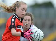 26 June 2016; Ally Cahill, Killygarry, Co. Cavan in action against Katie Scully, Kilcullen, Co. Kildare during the John West Féile Peile na nÓg Division 2 Girls Final at Austin Stack Park in Tralee, Co Kerry.  Photo by Matt Browne/Sportsfile