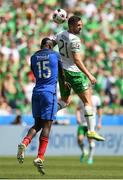 26 June 2016; Daryl Murphy of Republic of Ireland and Paul Pogba of France during the UEFA Euro 2016 Round of 16 match between France and Republic of Ireland at Stade des Lumieres in Lyon, France. Photo by Stephen McCarthy/Sportsfile