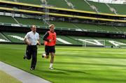 10 August 2010; Republic of Ireland's Kevin Doyle, jogging around the pitch with team physio Ciaran Murray during squad training ahead of their international friendly against Argentina on Wednesday. Republic of Ireland squad training, Aviva Stadium, Lansdowne Road, Dublin. Picture credit: David Maher / SPORTSFILE