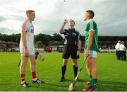 28 June 2016; Captains Mike Casey of Limerick, right, and Patrick Collins of Cork, left, with referee Rory McGann during the coin toss ahead of the Bord Gáis Energy Munster U21 Hurling Championship Quarter-Final match between Limerick and Cork at Páirc Uí Rinn in Cork. Photo by Seb Daly/Sportsfile