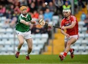 28 June 2016; Richie English of Limerick in action against Shane Kingston of Cork during the Bord Gáis Energy Munster U21 Hurling Championship Quarter-Final match between Limerick and Cork at Páirc Uí Rinn in Cork. Photo by Seb Daly/Sportsfile