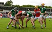 28 June 2016; Colin Ryan and Darragh O’Donovan of Limerick in action against Tim O Mahony of Cork during the Bord Gáis Energy Munster U21 Hurling Championship Quarter-Final match between Limerick and Cork at Páirc Uí Rinn in Cork. Photo by Seb Daly/Sportsfile