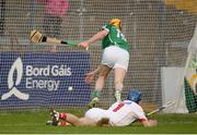28 June 2016; Oisin O’Reilly of Limerick scores his side's third goal past Patrick Collins of Cork during the Bord Gáis Energy Munster U21 Hurling Championship Quarter-Final match between Limerick and Cork at Páirc Uí Rinn in Cork. Photo by Seb Daly/Sportsfile