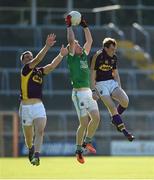 25 June 2016; Aidan Breen of Fermanagh in action against Daiti Waters, left, and Kevin O'Grady of Wexford during their GAA Football All-Ireland Senior Championship Round 1B match at Innovate Wexford Park in Wexford. Photo by Diarmuid Greene/Sportsfile