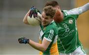 25 June 2016; Johhny Moloney of Offaly in action against Cormac Coyne of London during the GAA Football All-Ireland Senior Championship Round 1B game between Offaly and London at O'Connor Park in Tullamore, Co Offaly. Photo by Piaras Ó Mídheach/Sportsfile