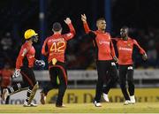 29 June 2016; Sunil Narine (2R) of Trinbago Knight Riders celebrates the dismissal of Andre Fletcher of St Lucia Zouks during Match 1 of the Hero Caribbean Premier League between Trinbago Knight Riders and St Lucia Zouks at the Queen's Park Oval in Port of Spain, Trinidad. Photo by Randy Brooks/Sportsfile