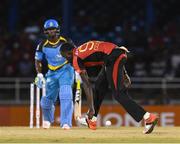 29 June 2016; Kevon Cooper of Trinbago Knight Riders, right, stops Johnson Charles of St Lucia Zouks from scoring during Match 1 of the Hero Caribbean Premier League between Trinbago Knight Riders and St Lucia Zouks at the Queen's Park Oval in Port of Spain, Trinidad. Photo by Randy Brooks/Sportsfile