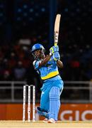 29 June 2016; Johnson Charles of St Lucia Zouks hits 4 during Match 1 of the Hero Caribbean Premier League between Trinbago Knight Riders and St Lucia Zouks at the Queen's Park Oval in Port of Spain, Trinidad. Photo by Randy Brooks/Sportsfile