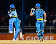 29 June 2016; Darren Sammy and David Miller of St Lucia Zouks celebrate winning Match 1 of the Hero Caribbean Premier League between Trinbago Knight Riders and St Lucia Zouks at the Queen's Park Oval in Port of Spain, Trinidad. Photo by Randy Brooks/Sportsfile