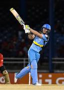 29 June 2016; David Miller of Trinbago Knight Riders hits 6 during Match 1 of the Hero Caribbean Premier League between Trinbago Knight Riders and St Lucia Zouks at the Queen's Park Oval in Port of Spain, Trinidad. Photo by Randy Brooks/Sportsfile