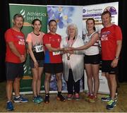 29 June 2016; Georgina Drumm, President of Athletics Ireland presents a trophy to the second place mixed team from AIB Bank after the Grant Thornton Corporate 5km Team Challenge at The Mall in Cork City. Photo by Matt Browne/Sportsfile