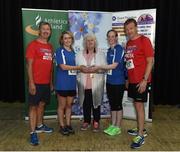 29 June 2016; Georgina Drumm, President of Athletics Ireland presents a trophy to the third place womens team from Tyco after the Grant Thornton Corporate 5km Team Challenge at The Mall in Cork City. Photo by Matt Browne/Sportsfile