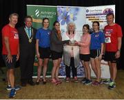 29 June 2016; Georgina Drumm, President of Athletics Ireland presents a trophy to the winners of the womens team from Trend Micro after the Grant Thornton Corporate 5km Team Challenge at The Mall in Cork City. Photo by Matt Browne/Sportsfile