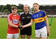 30 June 2016; Team captains Niall O'Leary, left, of Cork and Brian McGrath of Tipperary, with referee Johnny Murphy before the Electric Ireland Munster GAA Hurling Minor Championship Semi-Final game between Cork and Tipperary at Pairc Ui Rinn in Cork. Photo by Eóin Noonan/Sportsfile