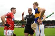 30 June 2016; Team captains Niall O'Leary, left, of Cork and Brian McGrath of Tipperary with referee Johnny Murphy before the Electric Ireland Munster GAA Hurling Minor Championship Semi-Final game between Cork and Tipperary at Pairc Ui Rinn in Cork. Photo by Eóin Noonan/Sportsfile