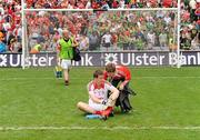 11 July 2010; Louth goalkeeper Neil Gallagher is comforted by a fan Ultan McEnaney at the end of the game. Leinster GAA Football Senior Championship Final, Meath v Louth, Croke Park, Dublin. Photo by Sportsfile