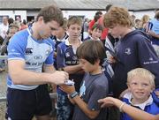 12 August 2010; Leinster's Gordon D'Arcy signs an autograph for Leinster supporter Matthew Good, from New Ross, Co. Wexford, after squad training. Leinster Rugby Pre-Season Preparations, Wexford Wanderers RFC, Wexford. Picture credit: Matt Browne / SPORTSFILE