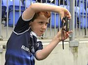 13 August 2010; Six-year-old Ben Edward Golding, from Ballsbridge, Dublin, records events as Brian O'Driscoll and Shane Jennings sign autographs at the Centra Leinster Rugby Summer Camps 2010. Donnybrook, Dublin. Picture credit: Ray McManus / SPORTSFILE