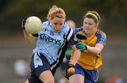14 August 2010; Orlagh Egan, Dublin, in action against Laurie Ryan, Clare. TG4 Ladies Football All-Ireland Senior Championship Quarter-Final, Clare v Dublin, St Rynagh's, Banagher, Co. Offaly. Picture credit: Brendan Moran / SPORTSFILE