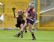 14 August 2010; Kate Kelly, Wexford, in action against Jacqui Frisby, Kilkenny. Gala All-Ireland Senior Camogie Championship Semi-Final, Kilkenny v Wexford, Nowlan Park, Kilkenny. Picture credit: Matt Browne / SPORTSFILE