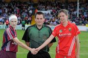 14 August 2010; Referee Karl O'Brien with Galway captain Therese Maher and Cork captain Orla Cotter. Gala All-Ireland Senior Camogie Championship Semi-Final, Galway v Cork, Nowlan Park, Kilkenny. Picture credit: Matt Browne / SPORTSFILE
