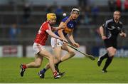 30 June 2016; Rian Doody of Tipperary in action against Ryan Walsh of Cork during the Electric Ireland Munster GAA Hurling Minor Championship Semi-Final game between Cork and Tipperary at Pairc Ui Rinn in Cork. Photo by Eóin Noonan/Sportsfile