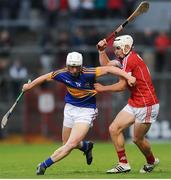 30 June 2016; Shane Neville of Tipperary in action against Sean O'Leary Hayes of Cork during the Electric Ireland Munster GAA Hurling Minor Championship Semi-Final game between Cork and Tipperary at Pairc Ui Rinn in Cork. Photo by Eóin Noonan/Sportsfile