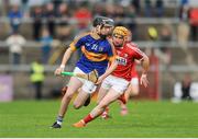 30 June 2016; Dylan Walsh of Tipperary in action against Niall O'Leary of Cork during the Electric Ireland Munster GAA Hurling Minor Championship Semi-Final game between Cork and Tipperary at Pairc Ui Rinn in Cork. Photo by Eóin Noonan/Sportsfile