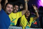 30 June 2016; Guyana fans cheer during Match 2 of the Hero Caribbean Premier League between St Kitts & Nevis Patriots and Guyana Amazon Warriors at Warner Park in Basseterre, St Kitts. Photo by: Ashley Allen/Sportsfile
