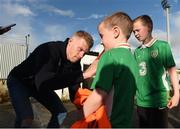 1 July 2016; Republic of Ireland international James McClean signs autographs for young supporters before the start of the SSE Airtricity League Premier Division match between Derry City and Dundalk at the Brandywell Stadium in Derry. Photo by David Maher/Sportsfile