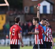 1 July 2016; Ryan McBride, left, of Derry City is shown the red card by referee Paul McLaughlin during the SSE Airtricity League Premier Division match between Derry City and Dundalk at the Brandywell Stadium in Derry. Photo by David Maher/Sportsfile
