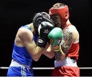 2 July 2016; Steven Donnelly of Ireland, right, exchanges punches with Khariton Agrba of Russia in their 69kg bout during a Boxing Test Match event between Ireland and Russia at The National Stadium in Dublin.Photo by Sportsfile