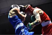 2 July 2016; Steven Donnelly of Ireland, right, exchanges punches with Khariton Agrba of Russia in their 69kg bout during a Boxing Test Match event between Ireland and Russia at The National Stadium in Dublin.Photo by Sportsfile