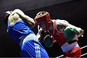 2 July 2016; Steven Donnelly of Ireland, right, exchanges punches with Khariton Agrba of Russia in their 69kg bout during a Boxing Test Match event between Ireland and Russia at The National Stadium in Dublin.Photo by Sportsfile