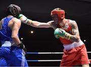 2 July 2016; Steven Donnelly of Ireland, right, exchanges punches with Khariton Agrba of Russia in their 69kg bout during a Boxing Test Match event between Ireland and Russia at The National Stadium in Dublin.Photo by Sportsfile