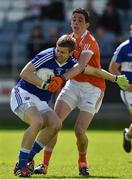 2 July 2016; Mark Timmons of Laois in action against Rory Grugan of Armagh during the GAA Football All-Ireland Senior Championship Round 1A Refixture at O'Moore Park in Portlaoise, Co. Laois. Photo by Sportsfile