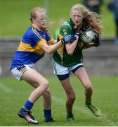 2 July 2016; Eimer Fay of Meath in action against Carrien Davey of Tipperary during the All-Ireland Ladies Football U14 'B' Championship Final at McDonagh Park in Nenagh, Co Tipperary. Photo by Ray Lohan/SPORTSFILE