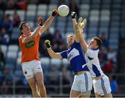 2 July 2016; Rory Grugan of Armagh in action against Mark Timmons and Graham Brody, right, of Laois, during the GAA Football All-Ireland Senior Championship Round 1A Refixture at O'Moore Park in Portlaoise, Co. Laois. Photo by Sportsfile