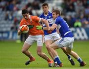 2 July 2016; Rory Grugan of Armagh is tackled by Mark Timmons of Laois during the GAA Football All-Ireland Senior Championship Round 1A Refixture at O'Moore Park in Portlaoise, Co. Laois. Photo by Sportsfile