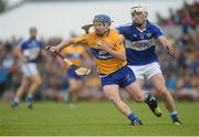 2 July 2016; Pádraic Collins of Clare in action against Ben Conroy of Laois during the GAA Hurling All-Ireland Senior Championship Round 1 match between Clare and Laois at Cusack Park in Ennis, Co Clare.  Photo by Piaras Ó Mídheach/Sportsfile