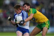 2 July 2016; Ryan McAnespie of Monaghan in action against Odhrán Mac Niallais of Donegal during the Ulster GAA Football Senior Championship Semi-Final Replay between Donegal and Monaghan at Kingspan Breffni Park in Cavan. Photo by Stephen McCarthy/Sportsfile