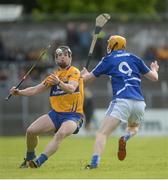 2 July 2016; Tony Kelly of Clare in action against Colm Stapleton of Laois during the GAA Hurling All-Ireland Senior Championship Round 1 match between Clare and Laois at Cusack Park in Ennis, Co Clare. Photo by Piaras Ó Mídheach/Sportsfile