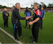 2 July 2016; Cork manager Kieran Kingston, right, is congratulated by Dublin manager Ger Cunningham following his side's victory during the GAA Hurling All-Ireland Senior Championship Round 1 match between Cork and Dublin at Pairc Ui Rinn in Cork. Photo by Seb Daly/Sportsfile