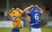 2 July 2016; Colin Ryan of Clare and Matthew Whelan of Laois prepare to exchange jerseys after the GAA Hurling All-Ireland Senior Championship Round 1 match between Clare and Laois at Cusack Park in Ennis, Co Clare. Photo by Piaras Ó Mídheach/Sportsfile