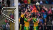 2 July 2016; Donegal goalkeeper Mark Anthony McGinley, left, Michael Murphy and Odhrán Mac Niallais, right, defend a late free during the Ulster GAA Football Senior Championship Semi-Final Replay between Donegal and Monaghan at Kingspan Breffni Park in Cavan. Photo by Stephen McCarthy/Sportsfile