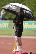 15 August 2010; A competitor takes shade during the Woodie's DIY AAI Masters Track & Field Championships. Tullamore Harriers Stadium, Tullamore, Co. Offaly. Picture credit: Tomas Greally / SPORTSFILE