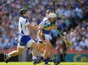 15 August 2010; Patrick Maher, Tipperary, is tackled by Waterford defenders Noel Connors, left, and Tony Browne. GAA Hurling All-Ireland Senior Championship Semi-Final, Waterford v Tipperary, Croke Park, Dublin. Picture credit: Ray McManus / SPORTSFILE