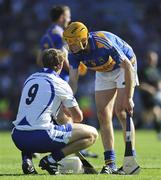 15 August 2010; Shane McGrath, Tipperary, commiserates with Richie Foley, Waterford. GAA Hurling All-Ireland Senior Championship Semi-Final, Waterford v Tipperary, Croke Park, Dublin. Picture credit: Dáire Brennan / SPORTSFILE
