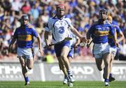 15 August 2010; John Mullane, Waterford, breaks away from Paddy Stapleton, left, and Conor O'Mahony, Tipperary. GAA Hurling All-Ireland Senior Championship Semi-Final, Waterford v Tipperary, Croke Park, Dublin. Picture credit: Dáire Brennan / SPORTSFILE